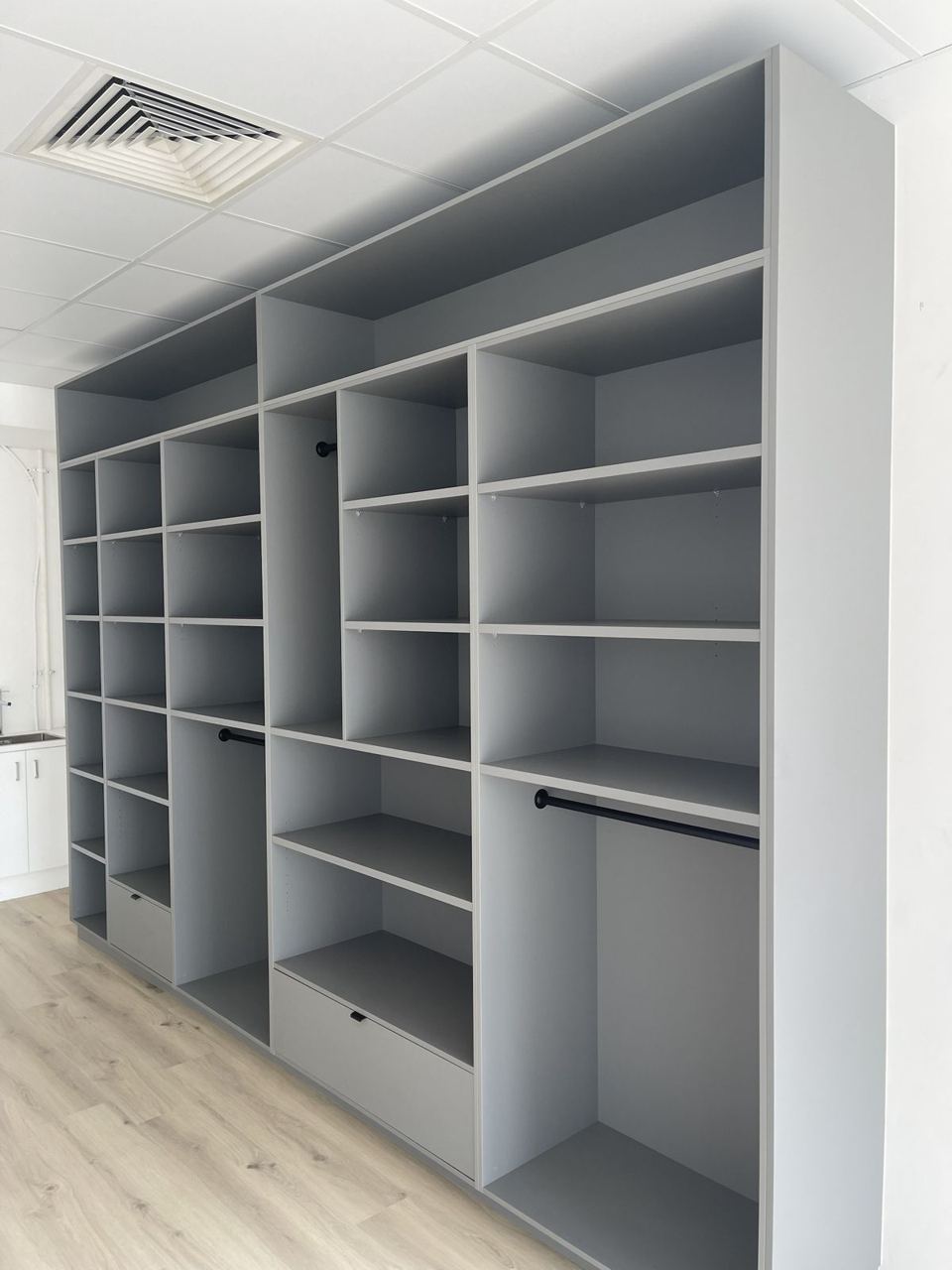Full-height retail shelving wall
